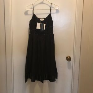 Spaghetti strap black dress with silk features